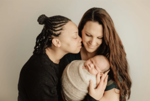 two lgbtq+ parents with new child after parenting therapy in Simi Valley, ca