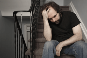 man struggling to cope with trauma seeking childhood trauma therapy in Simi Valley, ca