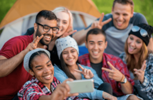 teens hanging out and taking photos together after one had anxiety therapy in Simi Valley, ca