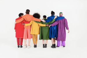 group of lgbtqia+ and allies coming together to support each other after lgbtqia+ affirming therapy